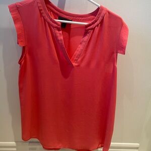 Light weight, soft, sleeveless top. Great summer colour